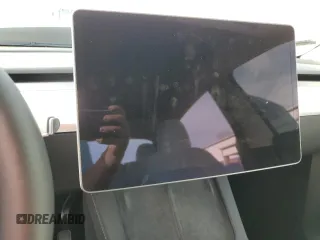 2024 Tesla Model Y Long Range с VIN 7SAYGDEE6RF149685, выставлен на аукционе Copart как лот 52986885 с пробегом Не указан миль и Списание • Salvage title. История ставок и продаж доступна на DreamBid. Изображение 9.