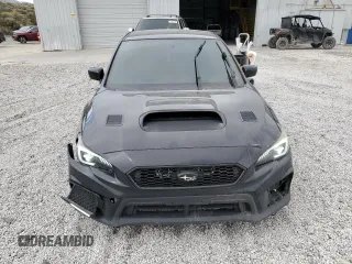 2018 Subaru WRX z VIN JF1VA1A6XJ9803137, wystawiony jako Copart lot #52558345 z przebiegiem 129 678 mil mil oraz Szkoda całkowita • Salvage title. Historia ofert i sprzedaży dostępna na DreamBid. Obrazek 5.