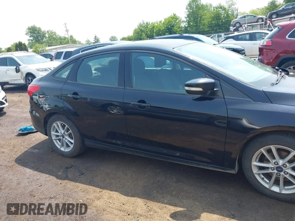 2017 Ford Focus SE with VIN 1FADP3F25HL292056, listed as a IAAI auction lot 42409320 with 102,956 mi miles and . Bid and sale history available at DreamBid. Image 13.