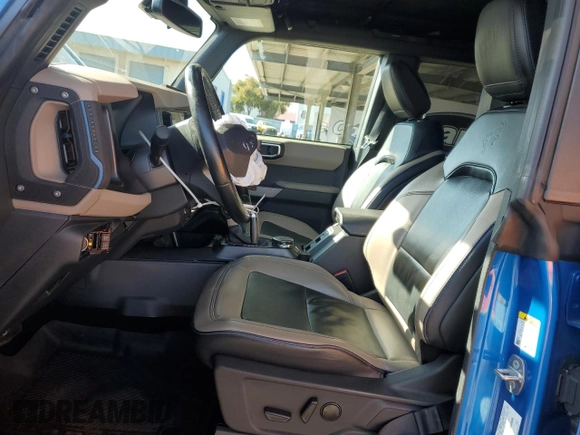 2022 Ford Bronco with VIN 1FMEE5DP1NLA82589, listed as a Copart auction lot 58793645 with 34,471 mi miles and Salvage title. Bid and sale history available at DreamBid. Image 7.