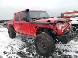 2020 Jeep Gladiator Overland with VIN 1C6HJTFG9LL152701, listed as a Copart auction lot 80737794 with 61,654 mi miles and Salvage title. Bid and sale history available at DreamBid. Image 4.