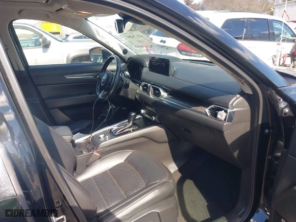 2021 Mazda CX-5 Grand Touring with VIN JM3KFBDM3M1318248, listed as a IAAI auction lot 41678260 with 71,903 mi miles. Bid and sale history available at carsss.com. Image 5.