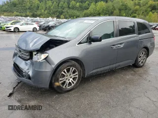 2012 Honda Odyssey EX-L with VIN 5FNRL5H64CB035196, listed as a Copart auction lot 71566704 with 243,529 mi miles and Salvage Title. Bid and sale history available at carsss.com. Image 1.