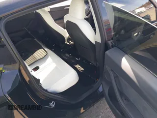 2025 Tesla Model Y Long Range with VIN 7SAYGDEEXSF267888, listed as a IAAI auction lot 41807129 with 3,002 mi miles and . Bid and sale history available at DreamBid. Image 8.