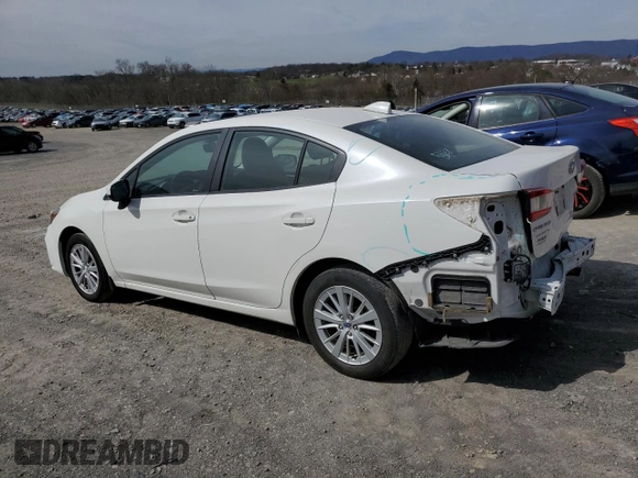 2017 Subaru Impreza Premium with VIN 4S3GKAD64H3601936, listed as a Copart auction lot 48664215 with 91,470 mi miles and Salvage title. Bid and sale history available at DreamBid. Image 2.