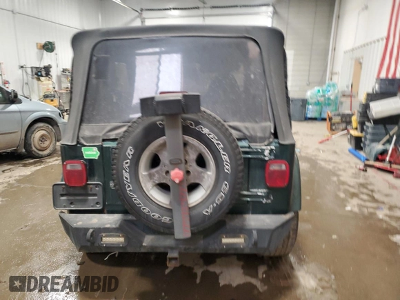 1999 Jeep Wrangler Sahara with VIN 1J4FY49SXXP451964, listed as a Copart auction lot 46120595 with 162,944 mi miles and Clean Title. Bid and sale history available at carsss.com. Image 6.