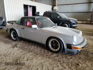 1988 Porsche 911 z VIN WP0EB0913JS161203, wystawiony jako Copart lot #71547754 z przebiegiem 109 128 mil mil oraz Szkoda całkowita • Salvage title. Historia ofert i sprzedaży dostępna na DreamBid. Obrazek 4.