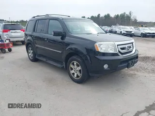 2009 Honda Pilot Touring with VIN 5FNYF48969B055806, listed as a IAAI auction lot 42138651 with 253,623 mi miles and . Bid and sale history available at carsss.com. Image 1.