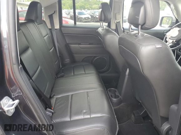 2015 Jeep Patriot Latitude with VIN 1C4NJRFBXFD176250, listed as a Copart auction lot 58903295 with 72,675 mi miles and Salvage title. Bid and sale history available at DreamBid. Image 11.