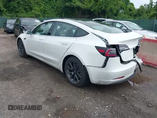 2019 Tesla Model 3 Mid Range z VIN 5YJ3E1EA7KF299755, wystawiony jako IAAI lot #42354352 z przebiegiem Nie podano mil oraz . Historia ofert i sprzedaży dostępna na DreamBid. Obrazek 3.