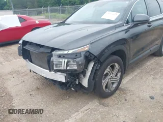 2021 Hyundai Santa Fe SE with VIN 5NMS14AJ5MH346250, listed as a IAAI auction lot 42299607 with 50,643 mi miles and . Bid and sale history available at DreamBid. Image 18.