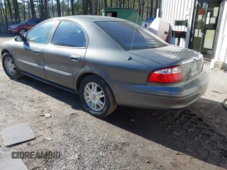2004 Mercury Sable LS Premium z VIN 1MEHM55S54G607845, wystawiony jako IAAI lot #41812758 z przebiegiem 200 883 mil mil oraz . Historia ofert i sprzedaży dostępna na DreamBid. Obrazek 3.