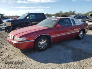 2000 Cadillac Eldorado z VIN 1G6EL12Y9YU174579, wystawiony jako Copart lot #80138994 z przebiegiem Nie podano mil oraz Szkoda całkowita • Salvage title. Historia ofert i sprzedaży dostępna na DreamBid. Obrazek 1.