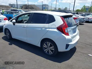 2015 Honda Fit EX-L with VIN 3HGGK5H89FM740430, listed as a IAAI auction lot 42255324 with 116,995 mi miles and . Bid and sale history available at DreamBid. Image 3.