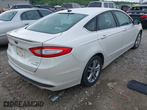 2016 Ford Fusion SE Hybrid with VIN 3FA6P0LU7GR356479, listed as a IAAI auction lot 42252046 with 119,046 mi miles and . Bid and sale history available at DreamBid. Image 4.