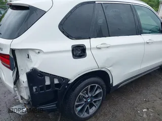 2018 BMW X5 xDrive35i z VIN 5UXKR0C50JL075205, wystawiony jako IAAI lot #42231107 z przebiegiem 38 412 mil mil oraz . Historia ofert i sprzedaży dostępna na DreamBid. Obrazek 18.