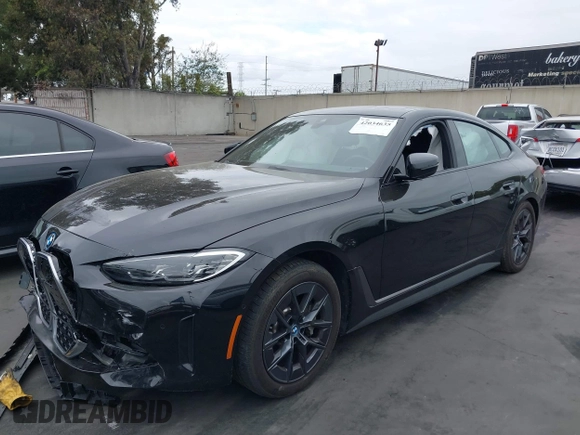 2023 BMW i4 eDrive40 z VIN WBY73AW03PFR16924, wystawiony jako IAAI lot #42034635 z przebiegiem 15 136 mil mil oraz . Historia ofert i sprzedaży dostępna na DreamBid. Obrazek 22.
