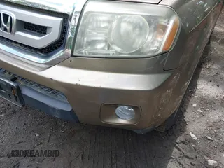 2009 Honda Pilot EX with VIN 5FNYF48409B041002, listed as a IAAI auction lot 42252034 with 116,938 mi miles and . Bid and sale history available at DreamBid. Image 6.