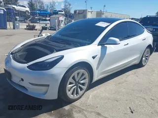 2023 Tesla Model 3 z VIN 5YJ3E1EA3PF451392, wystawiony jako IAAI lot #41668299 z przebiegiem 77 915 mil mil oraz . Historia ofert i sprzedaży dostępna na DreamBid. Obrazek 16.