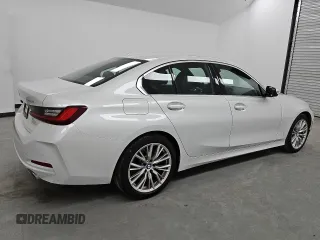 2024 BMW 3 Series 330i with VIN 3MW69FF00R8E89560, listed as a Copart auction lot 52459365 with 18,931 mi miles and Clean Title. Bid and sale history available at carsss.com. Image 3.