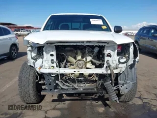 2014 Toyota Tacoma with VIN 3TMMU4FN9EM062808, listed as a IAAI auction lot 41450058 with 192,628 mi miles and . Bid and sale history available at DreamBid. Image 13.