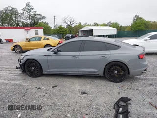 2019 Audi RS 5 Sportback z VIN WUABWCF54KA908298, wystawiony jako IAAI lot #41973097 z przebiegiem 84 666 mil mil oraz . Historia ofert i sprzedaży dostępna na DreamBid. Obrazek 13.