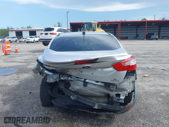 2013 Ford Focus SE with VIN 1FADP3F28DL217636, listed as a IAAI auction lot 42465123 with 187,088 mi miles and . Bid and sale history available at DreamBid. Image 17.