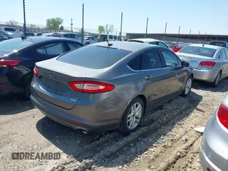 2014 Ford Fusion SE with VIN 3FA6P0HD9ER169363, listed as a IAAI auction lot 41994495 with 1,258,935 mi miles and . Bid and sale history available at DreamBid. Image 4.