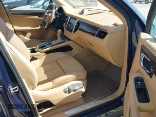 2015 Porsche Macan S with VIN WP1AB2A55FLB67075, listed as a IAAI auction lot 42068637 with 148,068 mi miles. Bid and sale history available at carsss.com. Image 5.