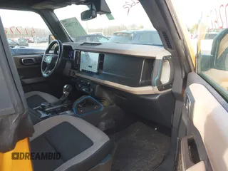 2022 Ford Bronco with VIN 1FMEE5DP8NLB67834, listed as a IAAI auction lot 41772622 with 58,667 mi miles. Bid and sale history available at carsss.com. Image 5.