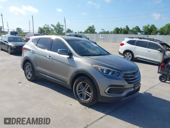 2017 Hyundai Santa Fe 2.4L z VIN 5XYZTDLB7HG444033, wystawiony jako IAAI lot #42263907 z przebiegiem 107 454 mil mil oraz . Historia ofert i sprzedaży dostępna na DreamBid. Obrazek 1.