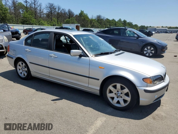 2003 BMW 3 Series 325i with VIN WBAAZ334X3PH33503, listed as a Copart auction lot 65090995 with 198,603 mi miles and Clean title. Bid and sale history available at DreamBid. Image 4.