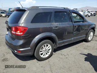 2017 Dodge Journey SXT with VIN 3C4PDCBB5HT701487, listed as a Copart auction lot 58821045 with 118,585 mi miles and Salvage title. Bid and sale history available at DreamBid. Image 3.