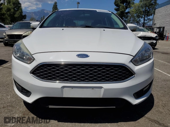 2016 Ford Focus SE with VIN 1FADP3K24GL225565, listed as a Copart auction lot 54949705 with 124,532 mi miles and Salvage Title. Bid and sale history available at carsss.com. Image 5.