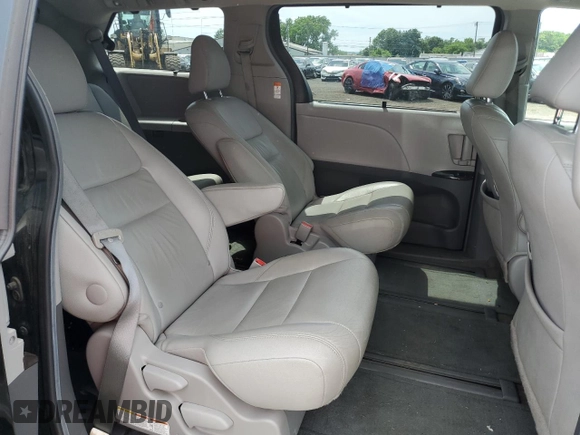 2017 Toyota Sienna XLE with VIN 5TDDZ3DC0HS150633, listed as a Copart auction lot 62642575 with 94,439 mi miles and Salvage title. Bid and sale history available at DreamBid. Image 11.