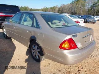 2000 Toyota Avalon XL with VIN 4T1BF28B7YU022621, listed as a IAAI auction lot 41883534 with 200,164 mi miles and . Bid and sale history available at DreamBid. Image 3.