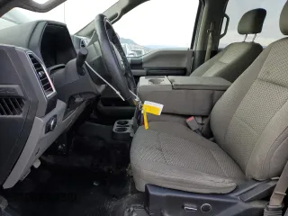 2015 Ford F-150 XLT with VIN 1FTEW1EG1FFA90068, listed as a Copart auction lot 84421594 with 150,386 mi miles and Salvage title. Bid and sale history available at DreamBid. Image 7.