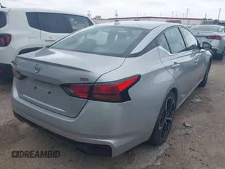 2023 Nissan Altima SR z VIN 1N4BL4CV6PN371181, wystawiony jako IAAI lot #42417091 z przebiegiem 52 700 mil mil oraz . Historia ofert i sprzedaży dostępna na DreamBid. Obrazek 4.