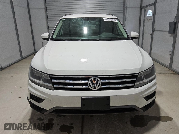2018 Volkswagen Tiguan S with VIN 3VV0B7AX0JM084884, listed as a Copart auction lot 59162025 with 106,399 mi miles and Clean title. Bid and sale history available at DreamBid. Image 5.