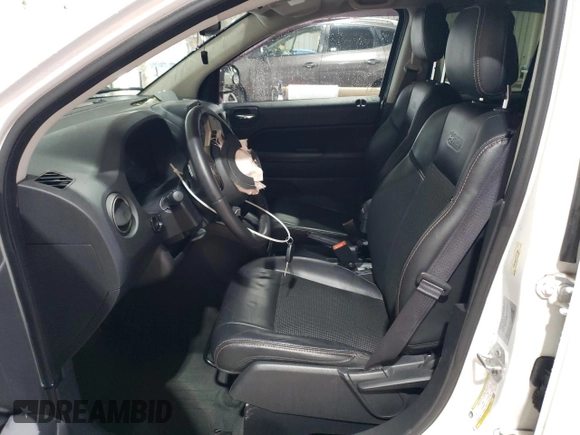 2017 Jeep Compass Sport with VIN 1C4NJCBB1HD141280, listed as a Copart auction lot 58989715 with 61,744 mi miles and Salvage title. Bid and sale history available at DreamBid. Image 7.