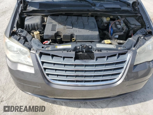 2010 Chrysler Town & Country Touring Plus with VIN 2A4RR8DX8AR382153, listed as a Copart auction lot 56470045 with 272,459 mi miles and Salvage Title. Bid and sale history available at DreamBid. Image 12.