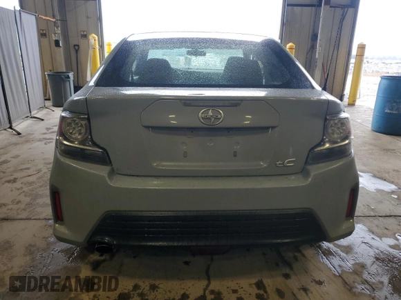 2014 Scion tC z VIN JTKJF5C7XE3071780, wystawiony jako Copart lot #47220975 z przebiegiem 102 630 mil mil oraz Szkody całkowita. Historia ofert i sprzedaży dostępna na DreamBid. Obrazek 6.