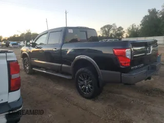 2016 Nissan Titan XD Platinum Reserve with VIN 1N6BA1F27GN512465, listed as a Copart auction lot 80720764 with 132,037 mi miles and Clean Title. Bid and sale history available at carsss.com. Image 2.