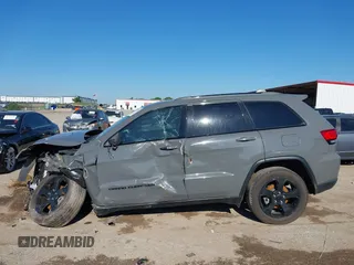 2019 Jeep Grand Cherokee Laredo E with VIN 1C4RJFAG2KC611457, listed as a IAAI auction lot 42212982 with 97,603 mi miles and . Bid and sale history available at DreamBid. Image 14.