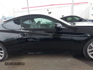 2013 Hyundai Genesis Coupe Premium z VIN KMHHT6KD0DU087180, wystawiony jako IAAI lot #42191739 z przebiegiem 78 837 mil mil oraz . Historia ofert i sprzedaży dostępna na DreamBid. Obrazek 14.