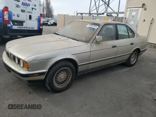 1990 BMW 5 Series with VIN WBAHD1317LBF09917, listed as a Copart auction lot 42562255 with 207,835 mi miles and Clean title. Bid and sale history available at DreamBid. Image 1.