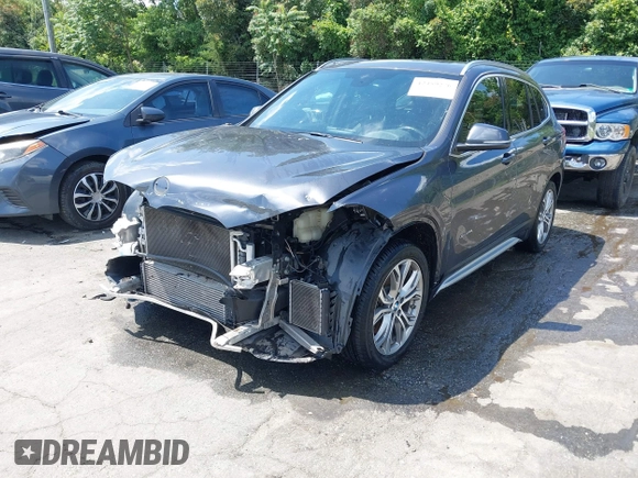 2017 BMW X1 xDrive28i with VIN WBXHT3Z38H4A55086, listed as a IAAI auction lot 42459276 with 101,907 mi miles and . Bid and sale history available at DreamBid. Image 18.