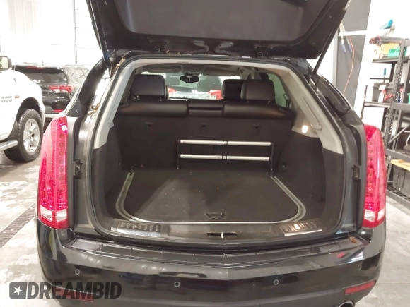 2011 Cadillac SRX Performance Collection with VIN 3GYFNEEY9BS675746, listed as a IAAI auction lot 41735676 with 113,079 mi miles and . Bid and sale history available at carsss.com. Image 12.