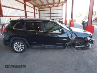 2019 Jeep Cherokee Latitude z VIN 1C4PJLCB1KD444428, wystawiony jako IAAI lot #42157384 z przebiegiem 58 948 mil mil oraz . Historia ofert i sprzedaży dostępna na DreamBid. Obrazek 13.
