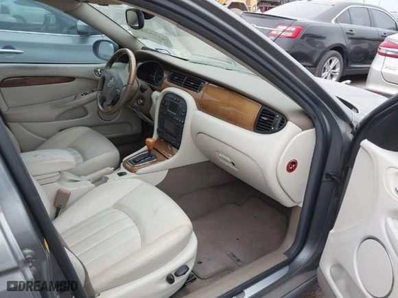 2003 Jaguar X-Type 2.5L Manual with VIN SAJEA51D73XD33247, listed as a IAAI auction lot 41680348 with NaN miles. Bid and sale history available at carsss.com. Image 5.